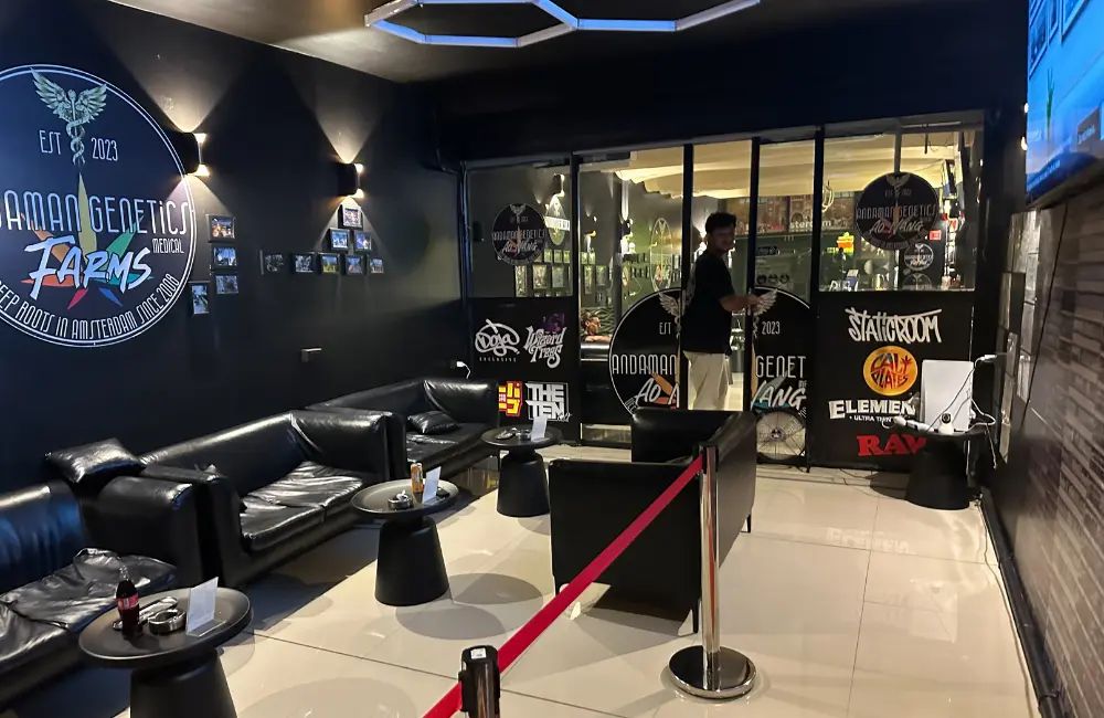 - Andaman Genetics indoor lounge with comfortable seating and live sports screens in Ao Nang, Krabi